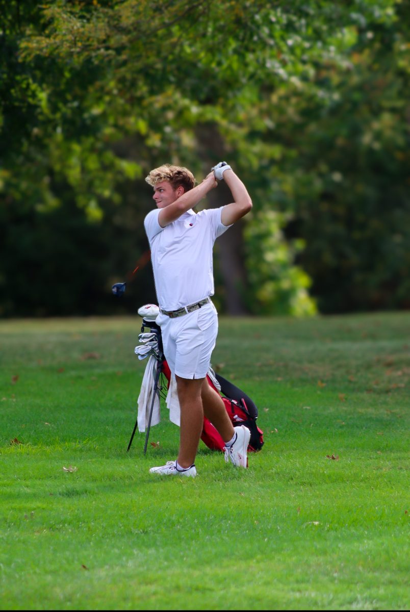 Boys Golf Swinging For Success